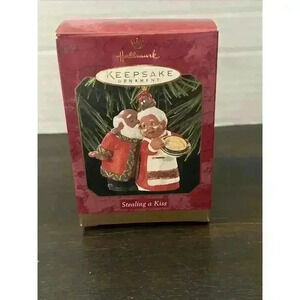 Hallmark Keepsake 1997 Christmas Ornament Santa "Stealing a Kiss" With Box